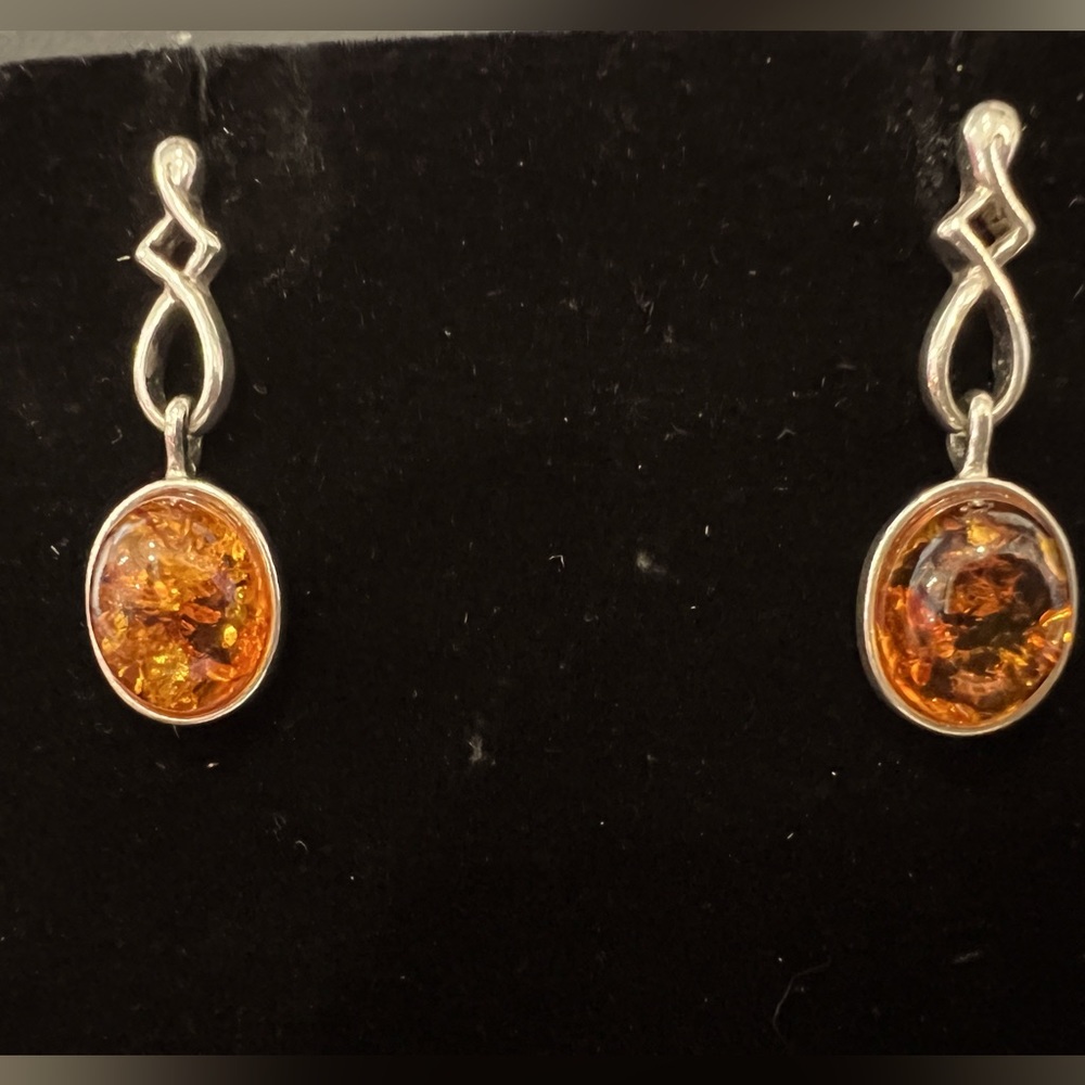Sterling Silver Stud Earrings with amber/orange stone.